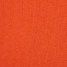 Hutschreuther Casual-Homesuit Nahaufnahme eines orangefarbenen Stoffes.