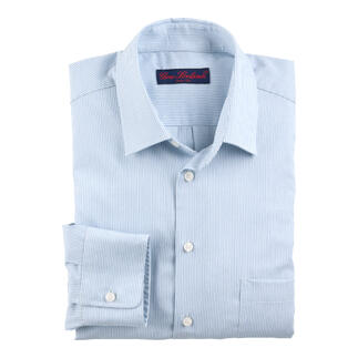 Gestreiftes Merino-Seiden-Hemd in Blau und Ecru, gefaltet.