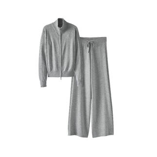 Grauer Kaschmir-Anzug bestehend aus Jacke und Hose auf weißem Hintergrund.