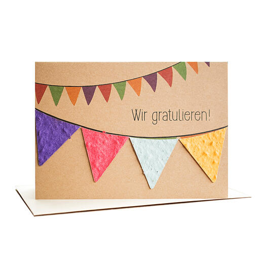 Grußkarte „Wir gratulieren“ mit Wimpeln aus handgeschöpftem Saatpapier. Grußkarte „Wir gratulieren“ mit Wimpeln aus handgeschöpftem Saatpapier.