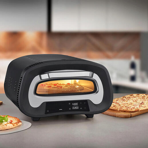 430 °C Pizzaofen auf einer Arbeitsfläche, umgeben von Zutaten