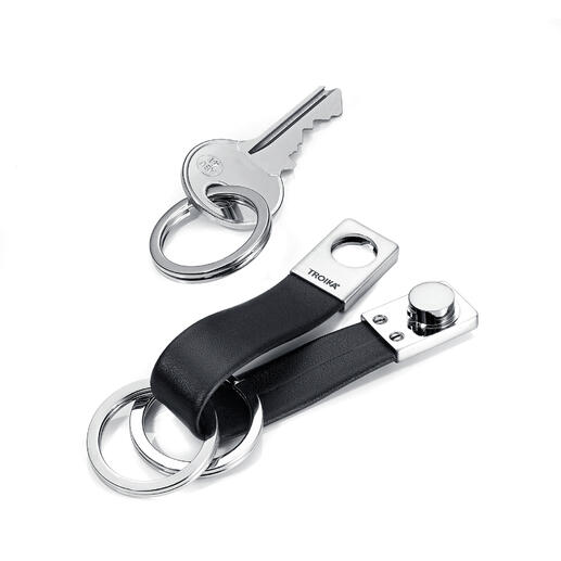 Schlüssel und Schlüsselhalter Twister in Schwarz und Silber.