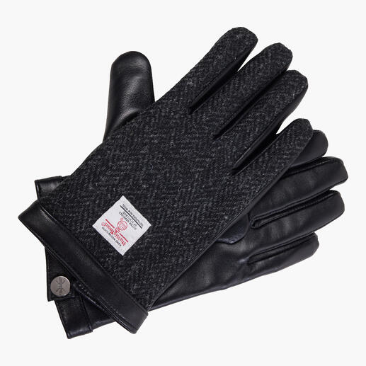 Schwarzer Harris Tweed Handschuh mit Lederdetails auf weißem Hintergrund
