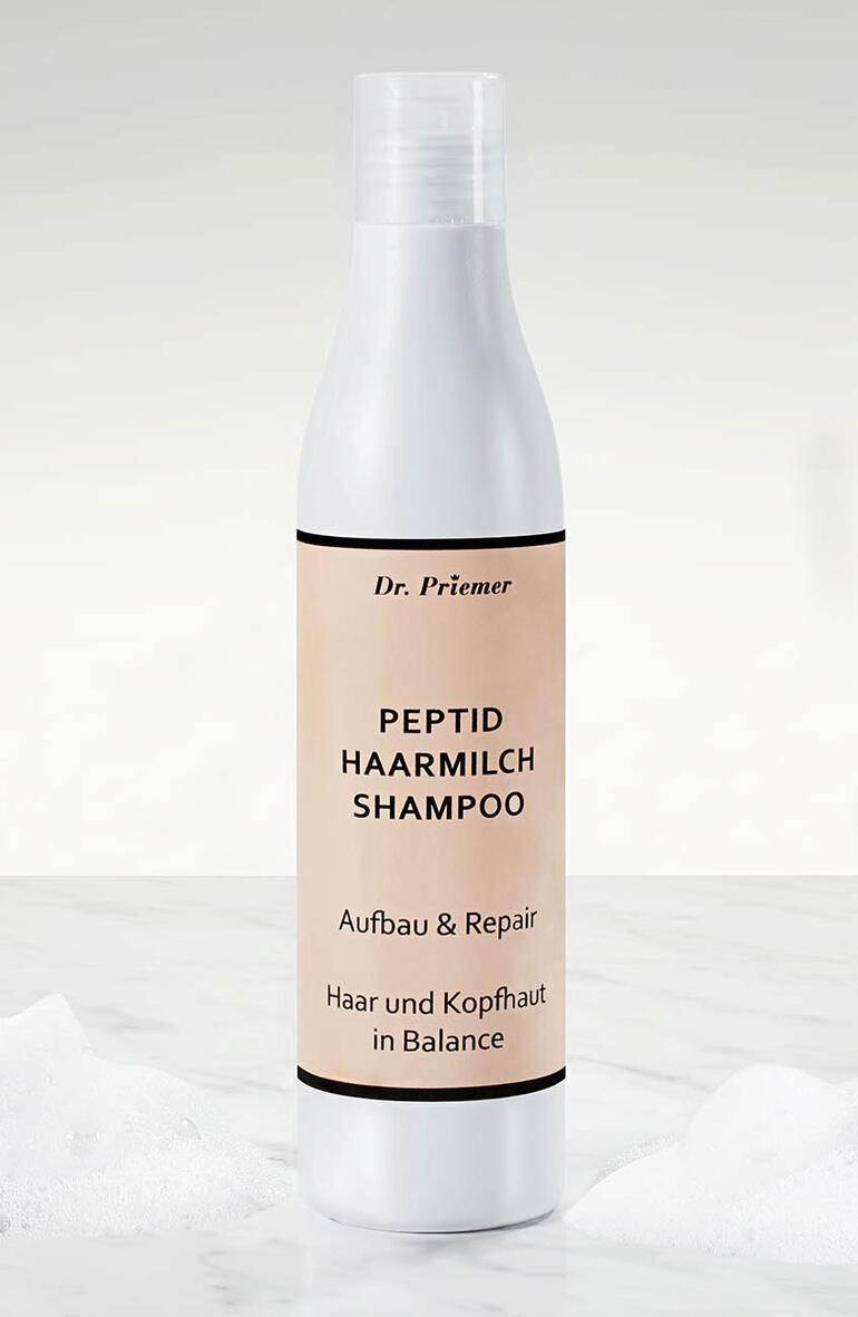 Flasche Haarmilch Aufbau- und Repair-Shampoo, 250 ml mit schlichtem Etikett.