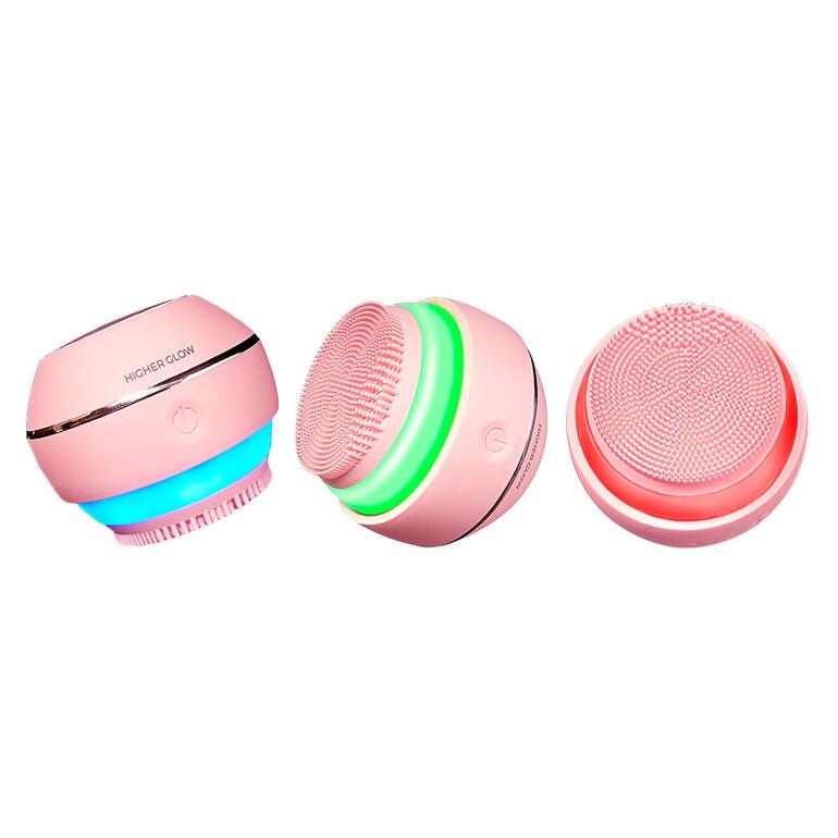 Mit 3 wählbaren Farben zur LED-Lichttherapie – individuell auf Ihren Hauttyp abgestimmt. Drei Ansicht der rosa Higher Glow Gesichtsbürste mit aktiven Lichtanzeigen.