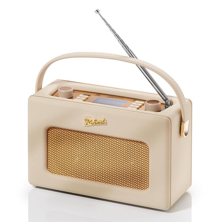 Roberts Radio Revival iStream 3L in Pastellcreme auf einem Tisch.