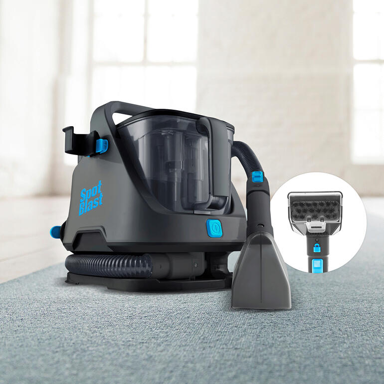 Kompakter Power-Waschsauger auf einem Teppich