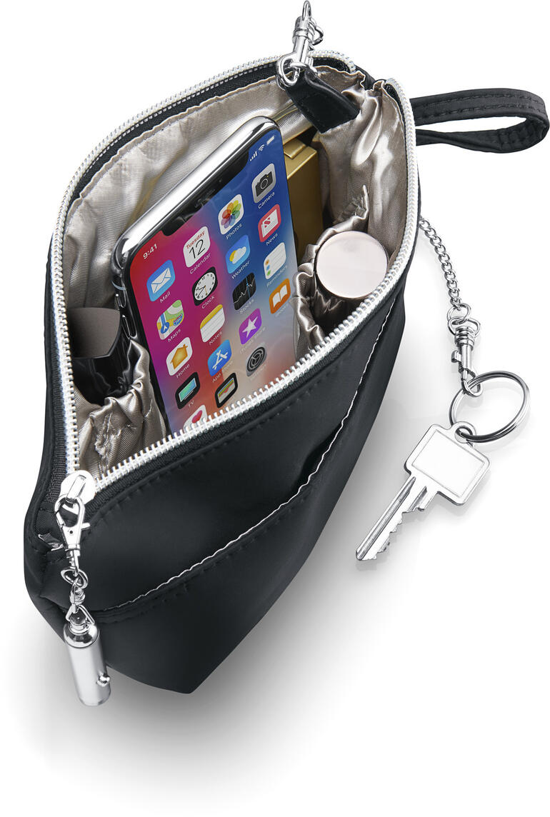 Schwarze Bag'nBag mit Smartphone und Kosmetik im Inneren.