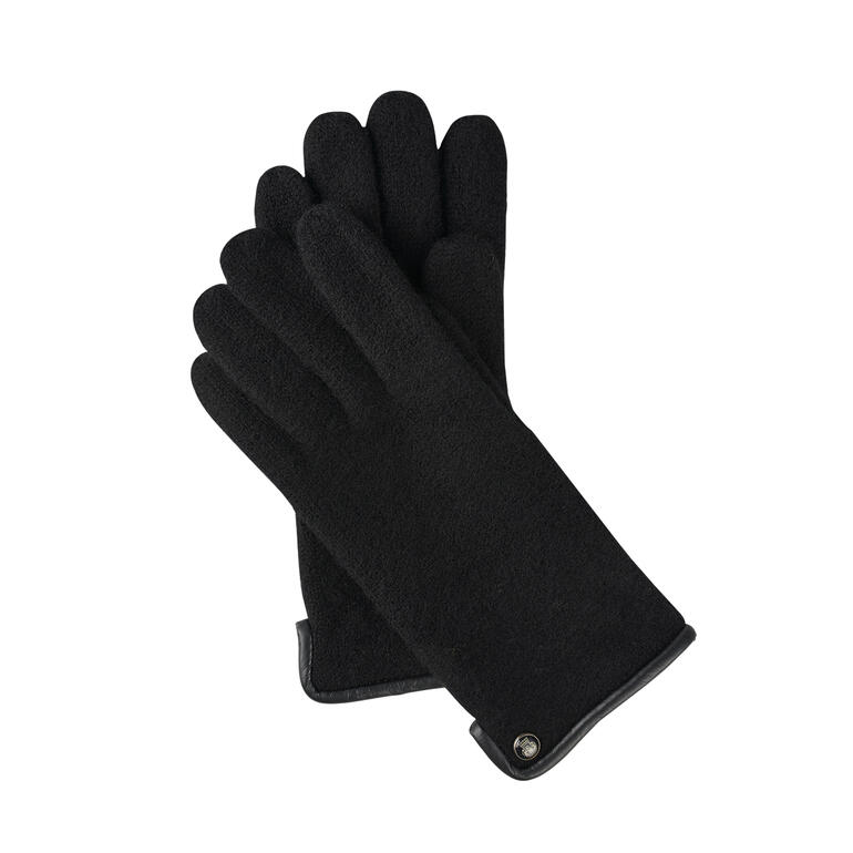 Schwarze Walkhandschuhe in angenehmer Textur, in der Hand gehalten.