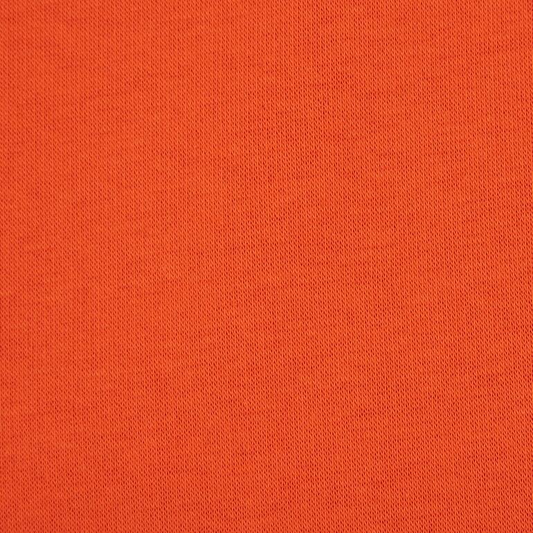 Nahaufnahme eines orangefarbenen Stoffes.