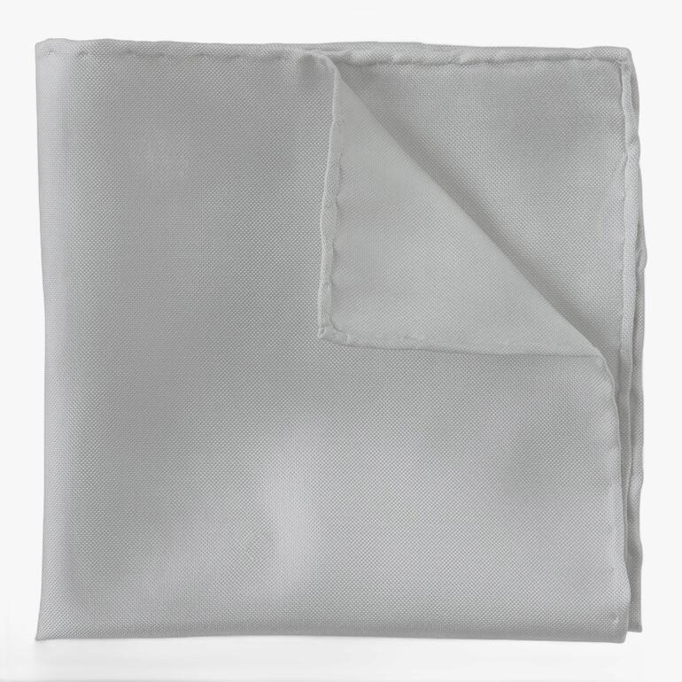 Helles Oxford-Seiden-Einstecktuch gefaltet.