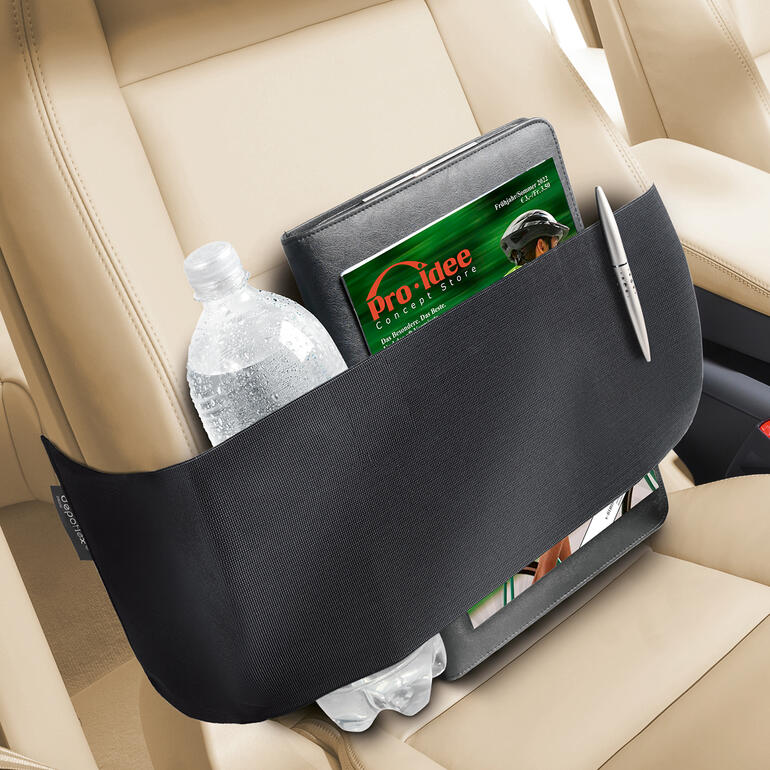 Ordnungsgurt im Auto, zur sicheren Aufbewahrung von Flaschen und Geräten.